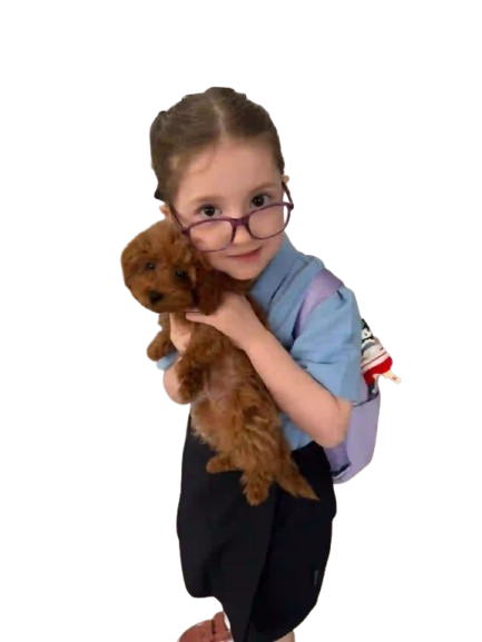 Small little girl loving the dog
